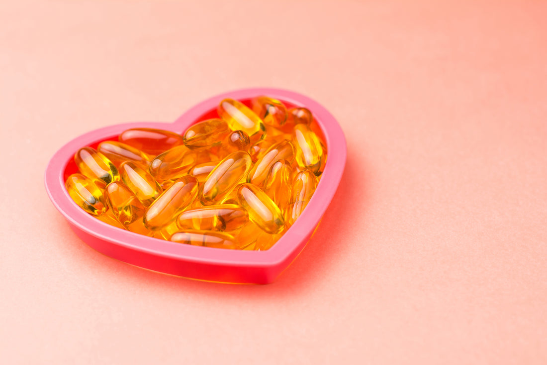 Fish oil capsules arranged in a heart